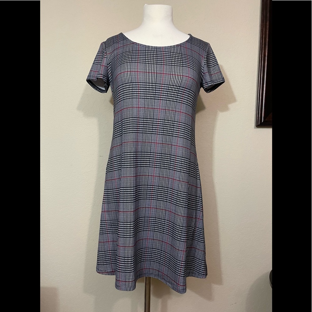 Dress, super soft and flowy. Skims the top of the knee.